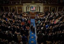 Lawmakers Oppose Execution Livestream Legislative chamber audience stands and applauds