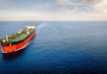 Iran War Could Last Another Year Oil tanker sailing on calm open sea