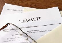 Judge Rejects Trump’s Firing Authority Legal documents labeled lawsuit on a desk