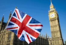 Nuclear Threats Raise Global Tensions Union Jack flag with Elizabeth Tower in the background