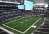 Alabama Monitors Hurricane Threat Ahead of Georgia Game American football stadium interior with large central video board