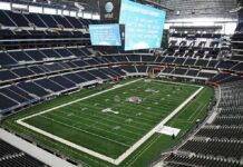 Alabama Monitors Hurricane Threat Ahead of Georgia Game American football stadium interior with large central video board